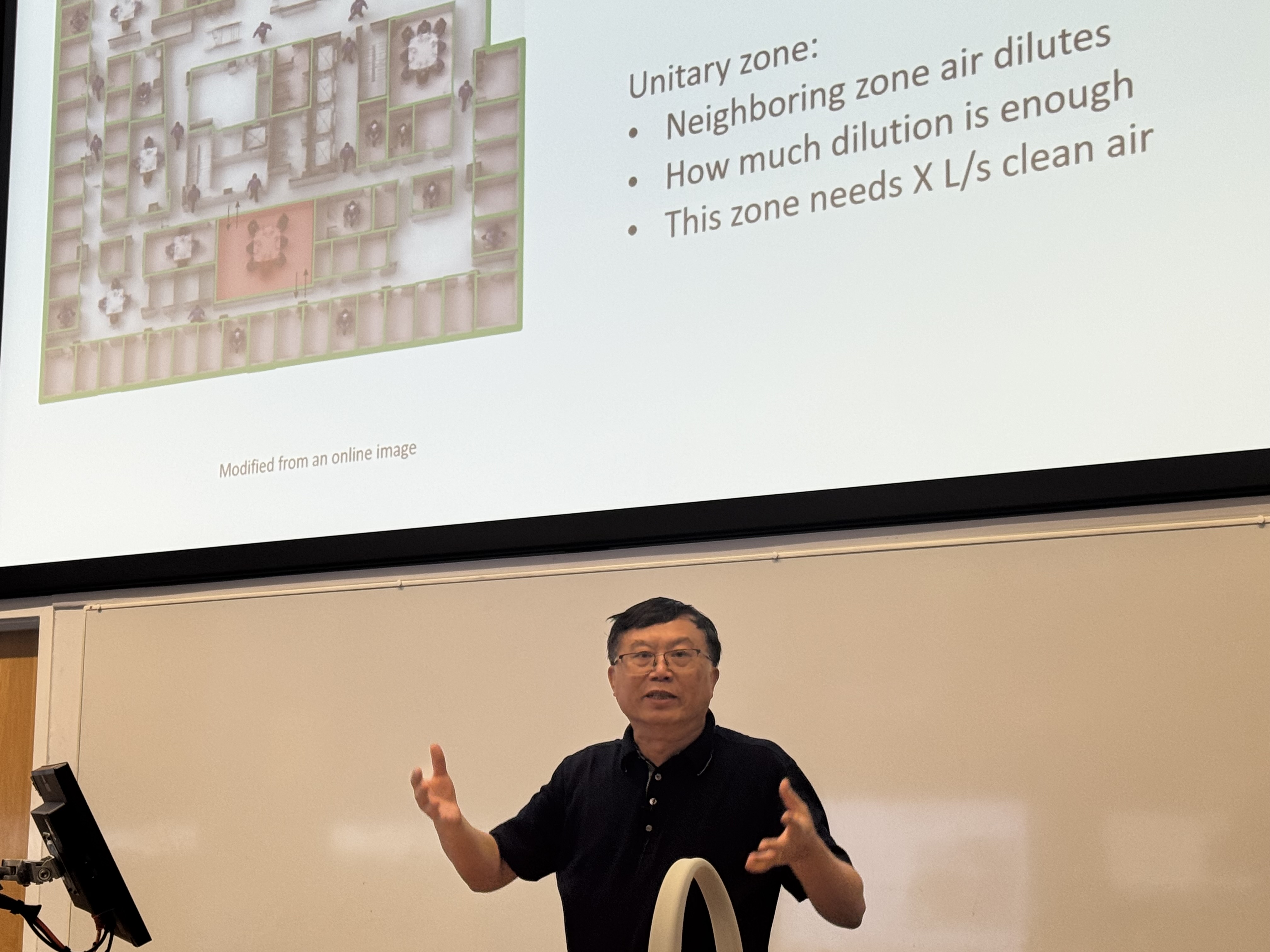 Professor Yuguo Li presenting on airborne infection transmission at the University of Leeds