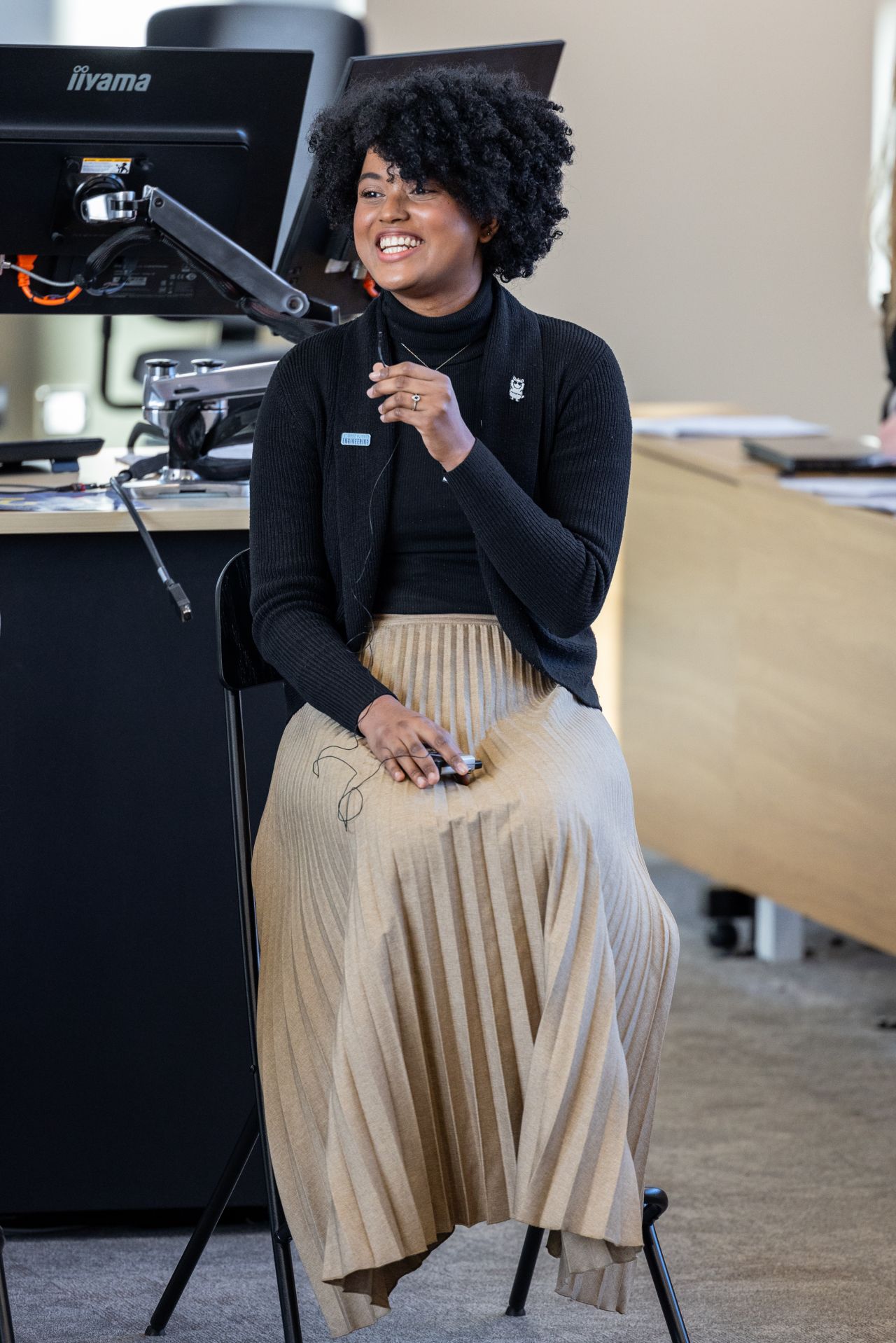 Dr. Claudia Castro Faccetti presenting at a school workshop
