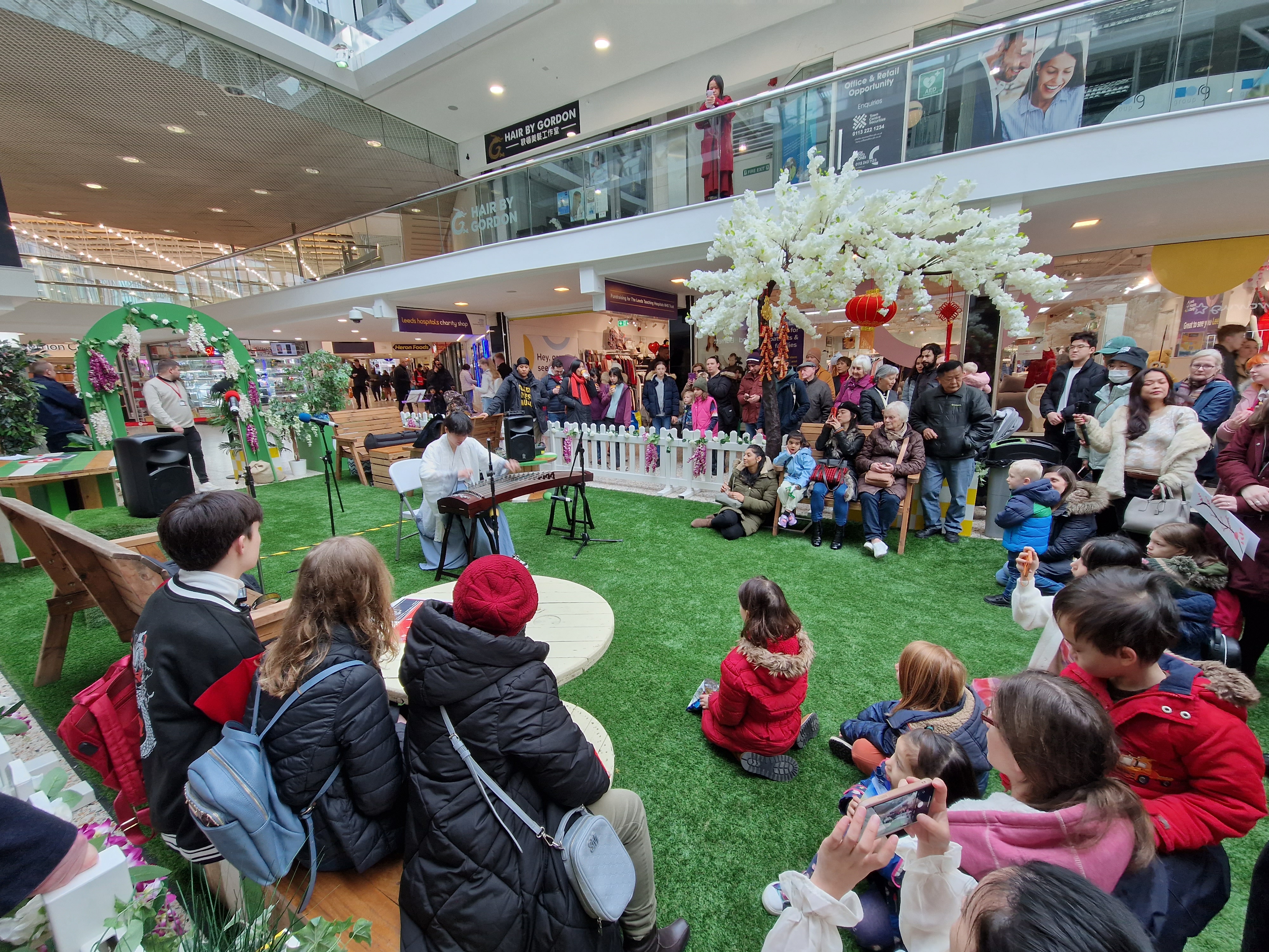 Performers on stage — wide view